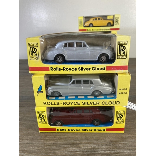 164 - Nine boxed Rolls Royce diecast model vehicles, seven H. Seener Ltd. and two Budgie