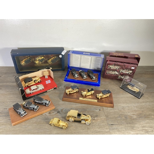 166 - A collection of various Rolls Royce diecast model vehicles to include boxed Lledo special 24 carat g... 