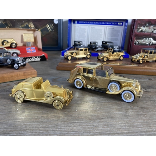 166 - A collection of various Rolls Royce diecast model vehicles to include boxed Lledo special 24 carat g... 