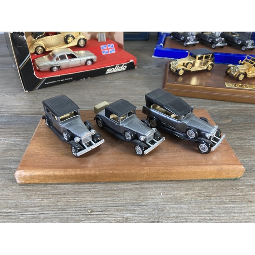 166 - A collection of various Rolls Royce diecast model vehicles to include boxed Lledo special 24 carat g... 