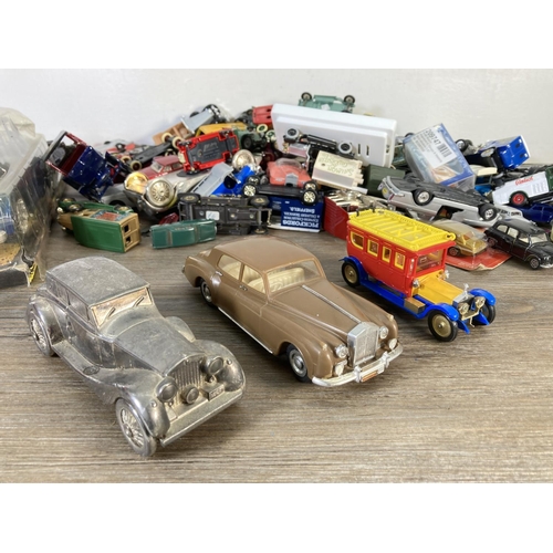 180 - A large collection of assorted diecast model vehicles to include Polistil Rolls Royce Corniche Droph... 