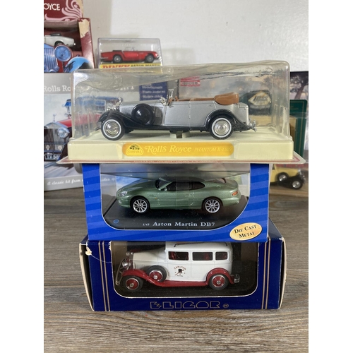 181 - A collection of assorted diecast model vehicles to include Rebell Rolls Royce Phantom I, Solido Roll... 