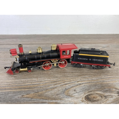 190 - Two HO gauge model locomotives, one Rivarossi Reno 4-4-0 clockwork steam locomotive with Virginia & ... 