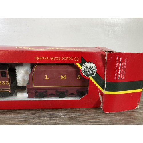 191 - A boxed Hornby R066 OO gauge LMS 4-6-2 Duchess of Sutherland model locomotive and tender