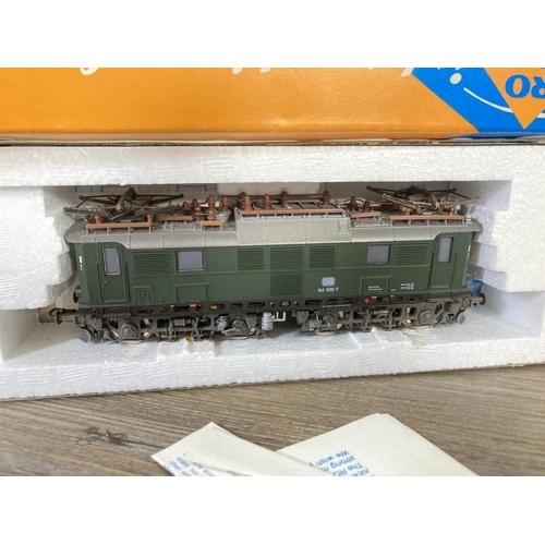 196 - Two boxed Roco HO gauge locomotives, one E1445 electric and one 4153 Sik Series 200-300 with spare w... 