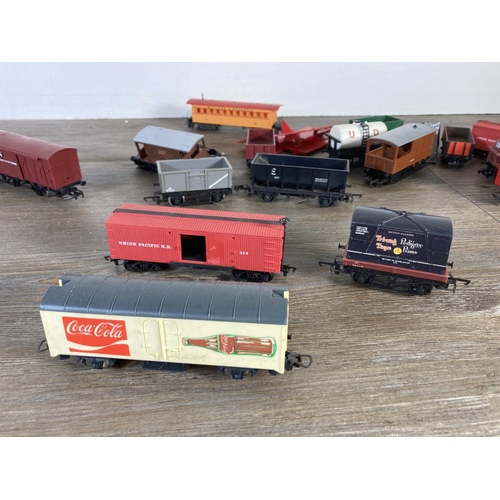 206 - A collection of various HO/OO gauge model railway accessories to include two Mainline passenger coac... 