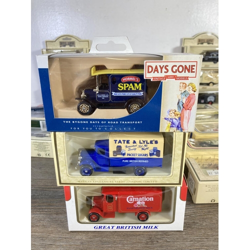 209 - A large collection of assorted boxed diecast model vehicles to include Lledo Days Gone, Vanguards Da... 