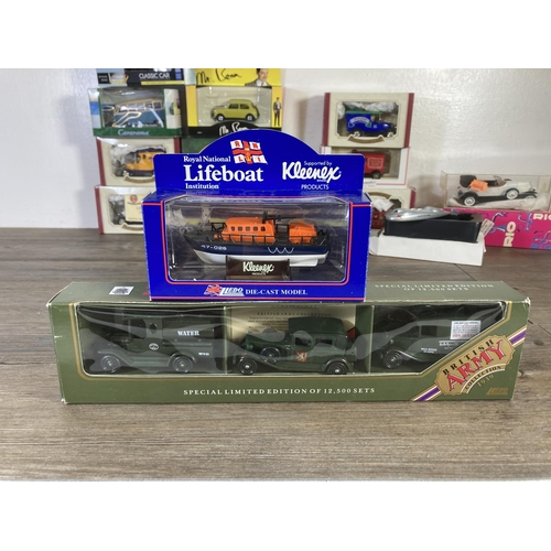 210 - A collection of assorted boxed diecast model vehicles to include Oxford Diecast, Classic Car Model C... 