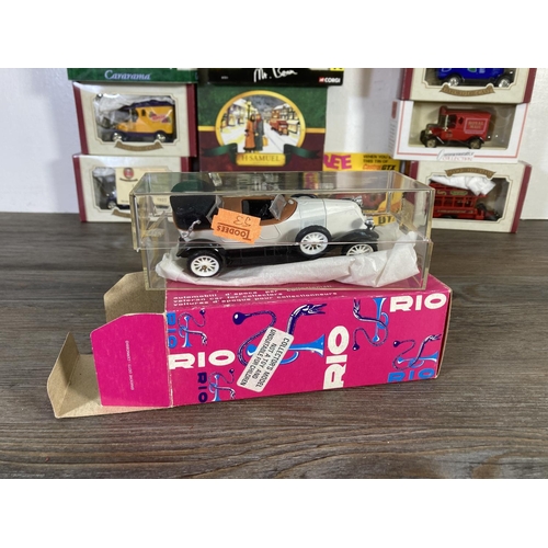 210 - A collection of assorted boxed diecast model vehicles to include Oxford Diecast, Classic Car Model C... 