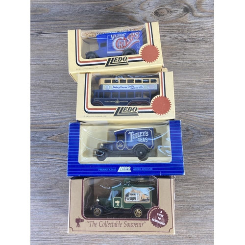 211 - A collection of assorted boxed diecast model vehicles to include Lledo Tetley's Tea's, Lledo promoti... 