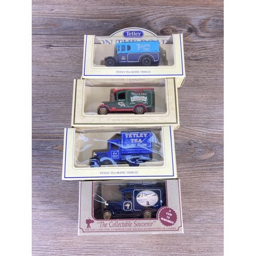 211 - A collection of assorted boxed diecast model vehicles to include Lledo Tetley's Tea's, Lledo promoti... 