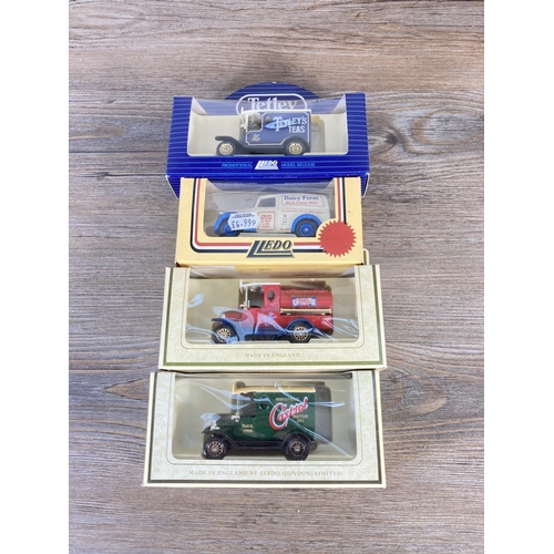 211 - A collection of assorted boxed diecast model vehicles to include Lledo Tetley's Tea's, Lledo promoti... 