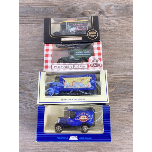 211 - A collection of assorted boxed diecast model vehicles to include Lledo Tetley's Tea's, Lledo promoti... 