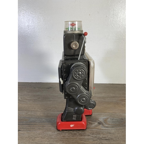 220 - A Japanese tin plate battery operated robot - approx. 29cm high