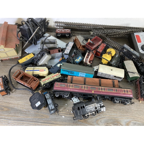 240 - A collection of assorted OO gauge model railway accessories to include track, Bachmann Blackpool Co-... 