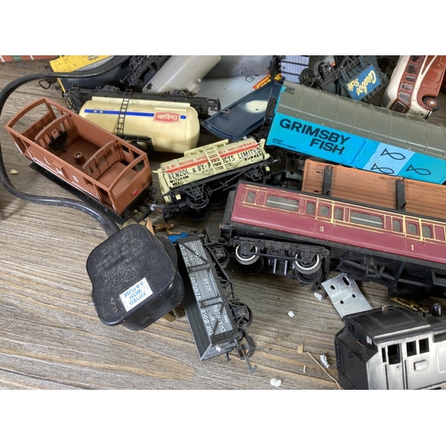 240 - A collection of assorted OO gauge model railway accessories to include track, Bachmann Blackpool Co-... 