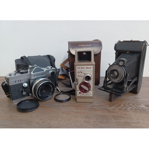 519 - Three cameras, one cased mid 1970s Japanese Petri TTL 35mm SLR fitted with Zeiss Tessar 2.8/50 lens,... 