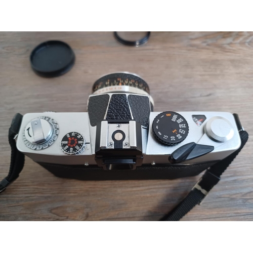 519 - Three cameras, one cased mid 1970s Japanese Petri TTL 35mm SLR fitted with Zeiss Tessar 2.8/50 lens,... 