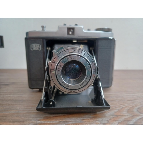 521 - Two Zeiss Ikon folding cameras for 120 film, one mid 1950s Nettar 518/16 Ih horizontal fitted with N... 