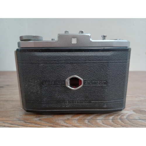 521 - Two Zeiss Ikon folding cameras for 120 film, one mid 1950s Nettar 518/16 Ih horizontal fitted with N... 