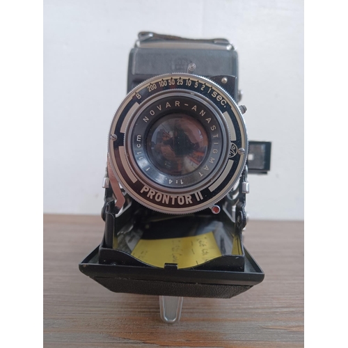 521 - Two Zeiss Ikon folding cameras for 120 film, one mid 1950s Nettar 518/16 Ih horizontal fitted with N... 