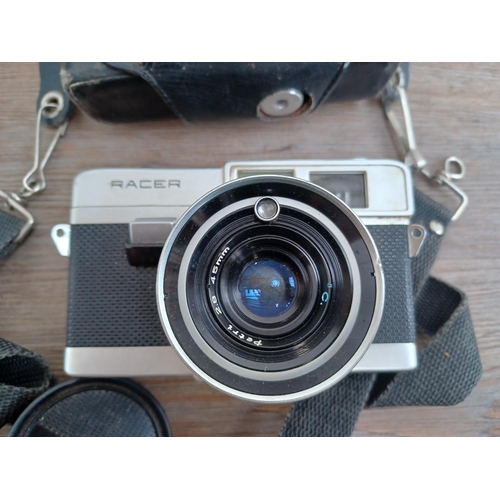 528 - Four cameras, one cased 1960s Japanese Petri Racer 35mm rangefinder, one Fujifilm Instax Mini 8 inst... 