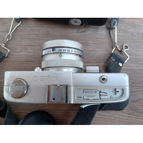 528 - Four cameras, one cased 1960s Japanese Petri Racer 35mm rangefinder, one Fujifilm Instax Mini 8 inst... 