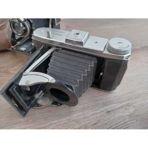 535 - Five folding cameras, one cased late 1930s Kodak Duo 620, one Zeiss Ikon Ikonta fitted with Zeiss Te... 