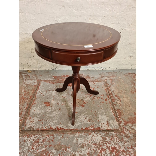 453 - A Regency style mahogany drum table with three drawers - approx. 61cm high x 51cm in diameter