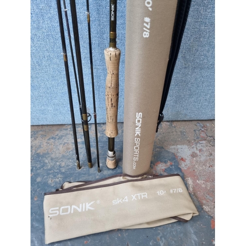 676 - Three cased fly fishing rods, one Shakespeare Expedition 9'6