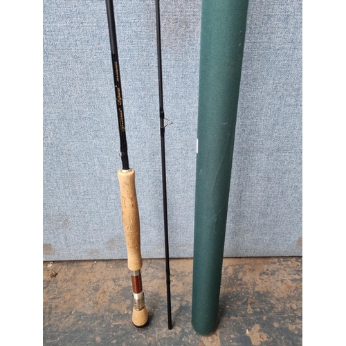 681 - A PFlueger Supreme PSF9089 9' two piece fly fishing rod with bamboo reel holder and cork handle