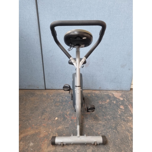 692 - A Carl Lewis SM5011 exercise bike with digital readout