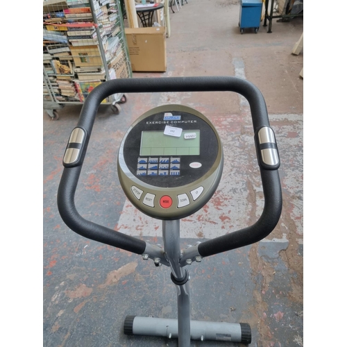 692 - A Carl Lewis SM5011 exercise bike with digital readout