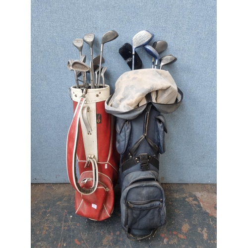 698 - Two golf bags containing assorted golf clubs to include Dunlop drivers, Spalding putters etc.