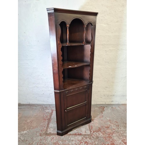 422 - Two pieces of oak furniture, one bookcase with three leaded glass doors and six internal glass shelv... 