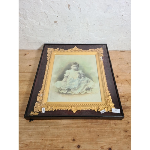 503 - An Edwardian cased and framed ambrotype of a young child signed lower right and dated 1910 - approx.... 