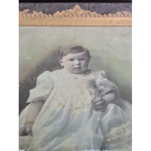 503 - An Edwardian cased and framed ambrotype of a young child signed lower right and dated 1910 - approx.... 