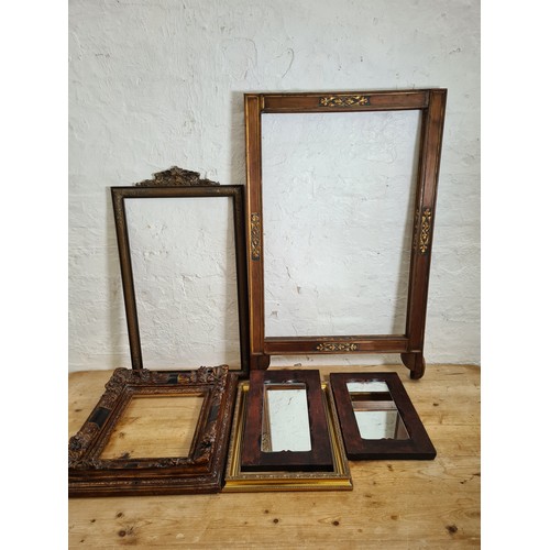 508 - Six items, four various gilt frames - largest approx. 92cm x 58cm and two modern hardwood framed wal... 