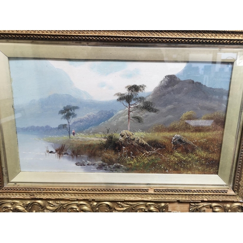 488 - Two late 19th/early 20th century gilt framed oil paintings of landscape scenes - approx. 63cm wide x... 