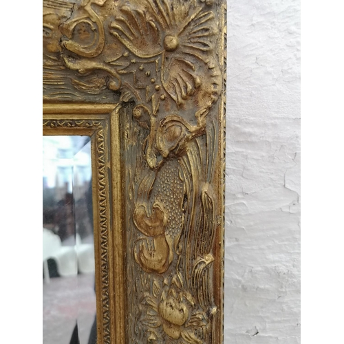 495 - A Victorian style gilt framed bevel edged wall mirror - approx. 110cm x 79cm