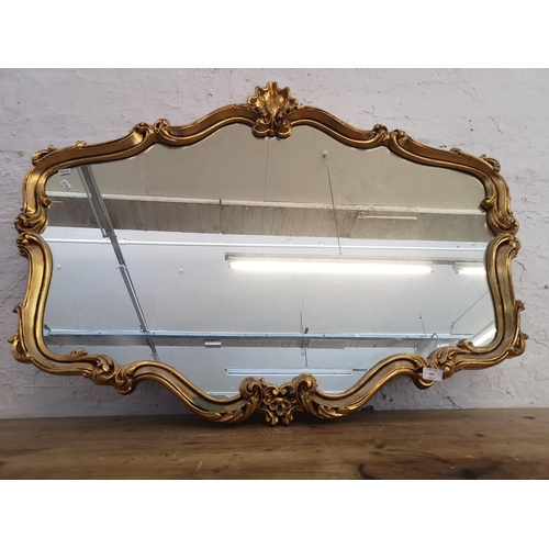 505 - A Rococo style gilt framed wall mirror - approx. 104cm wide x 80cm high