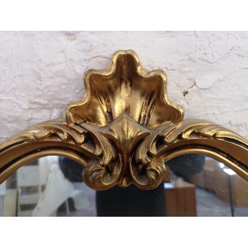 505 - A Rococo style gilt framed wall mirror - approx. 104cm wide x 80cm high