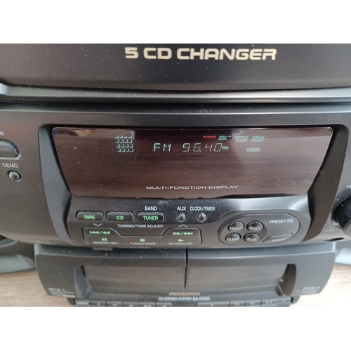 563 - A Panasonic SA-CH34 hi-fi system comprising five CD changer, twin cassette deck and tuner/amplifier ... 