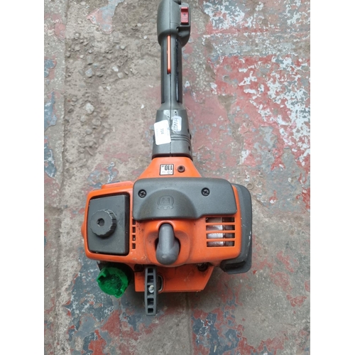 704 - A Husqvarna X-series 325LD petrol hedge trimmer