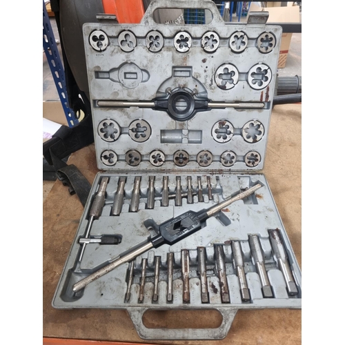 713 - A cased forty three piece tap and die set