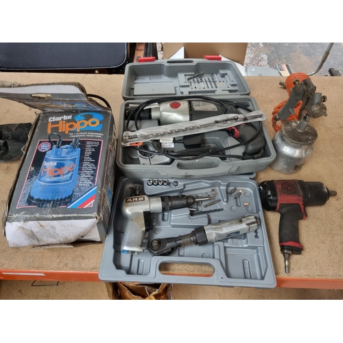 717 - Five items to include cased Performance Power 240V hammer drill, boxed Clarke Hippo 2 portable subme... 