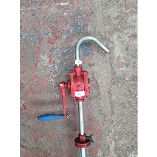 711 - A stainless steel and cast iron utility pump - approx. 128cm long