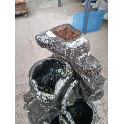 755 - A fibreglass garden water feature - approx. 91cm high x 40cm wide