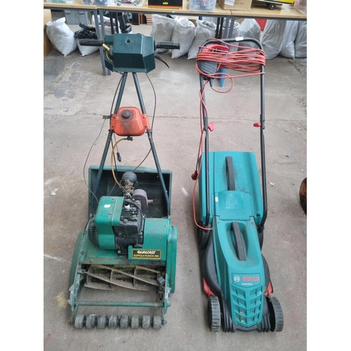 758 - Two lawnmowers, one Bosch Rotak 32R 240V with grass collector and one Qualcast Suffolk Punch 35S pet... 