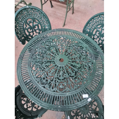 763 - A Victorian style cast aluminium five piece patio set comprising four chairs and one table